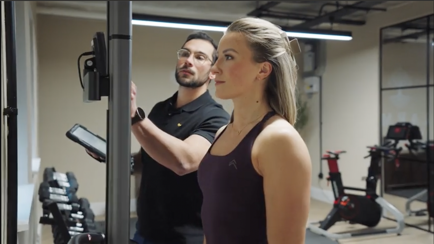 Body composition analysis session measuring body fat and muscle mass at Karma Health